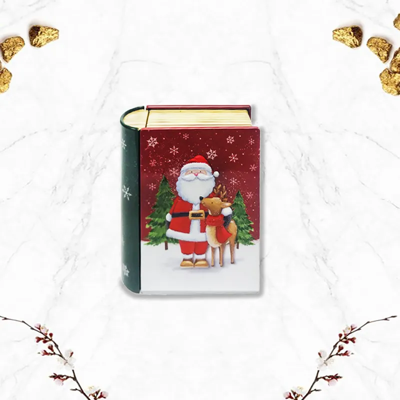 Метална кутия книга Santa’s Book с Дядо Коледа на капака и бисквити с канела 2026.